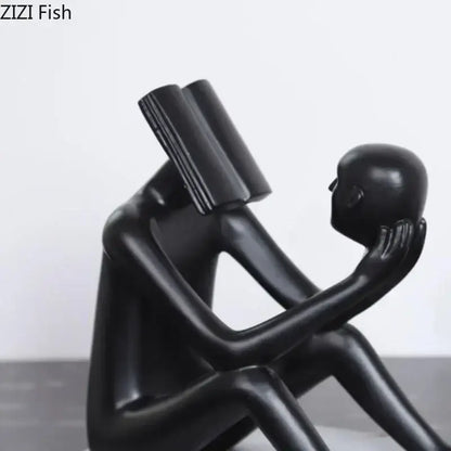 Modern black glossy abstract figure sculpture reading book bedroom decor