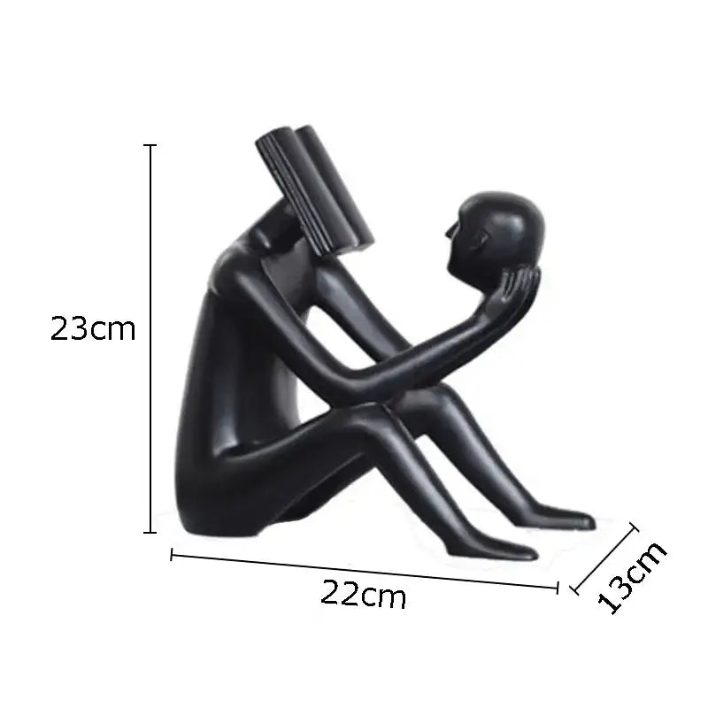 Modern black glossy abstract figure sculpture reading book bedroom decor