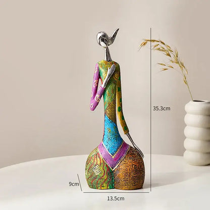 abstract woman sculpture vibrant patterned living room decor