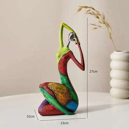 abstract woman sculpture vibrant patterned living room decor