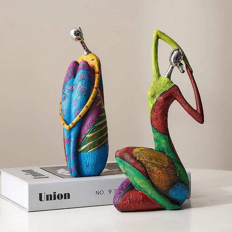 abstract woman sculpture vibrant patterned living room decor