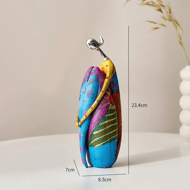 abstract woman sculpture vibrant patterned living room decor