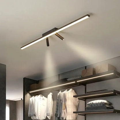 Modern minimalist black strip led chandelier with gold spotlights dining room