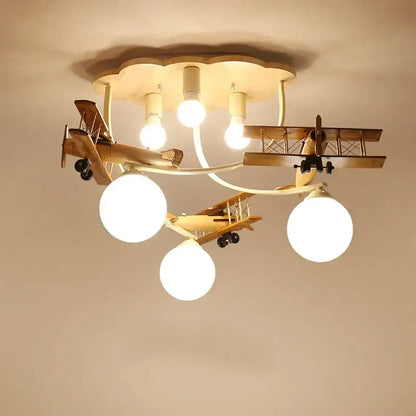 Wooden airplane chandelier light with cloud base for nursery room