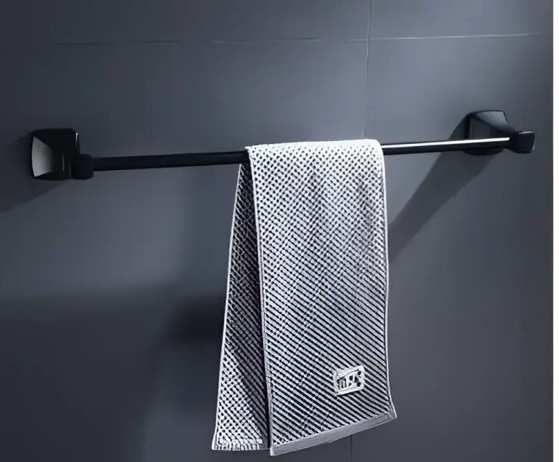 Matte black aluminum bathroom hardware set with towel rack and brush holder