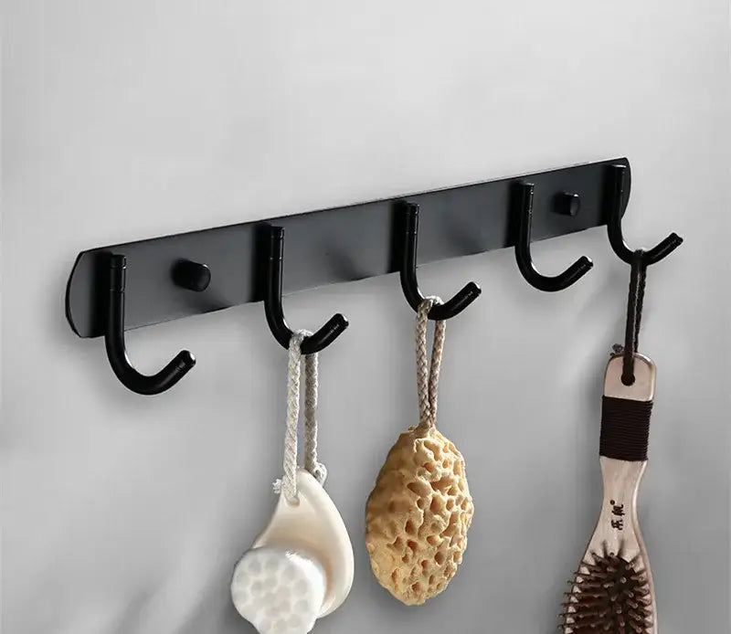 Matte black aluminum bathroom hardware set with towel rack and brush holder