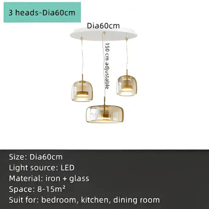 Modern amber glass chandelier with brass accents for living room
