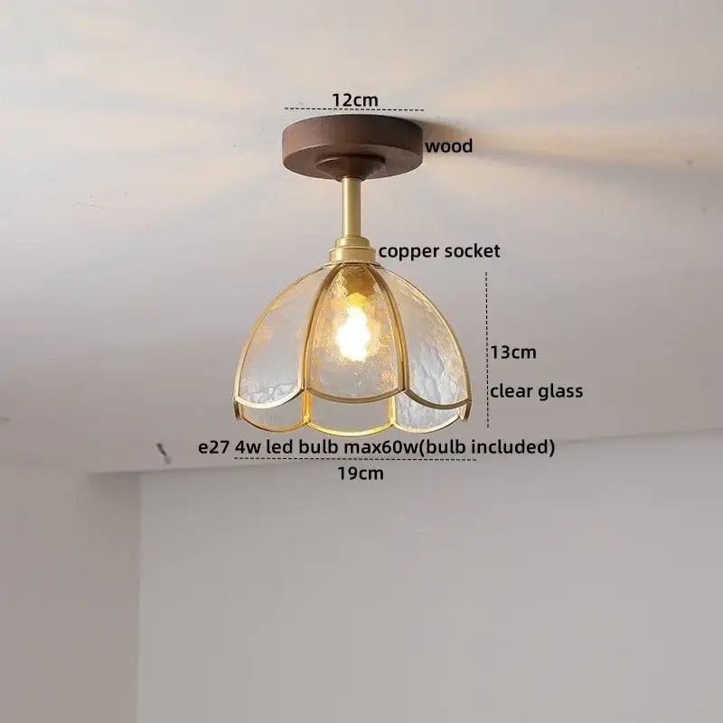 Modern amber glass and copper ceiling light fixture dining room