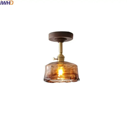 Modern amber glass and copper ceiling light fixture dining room