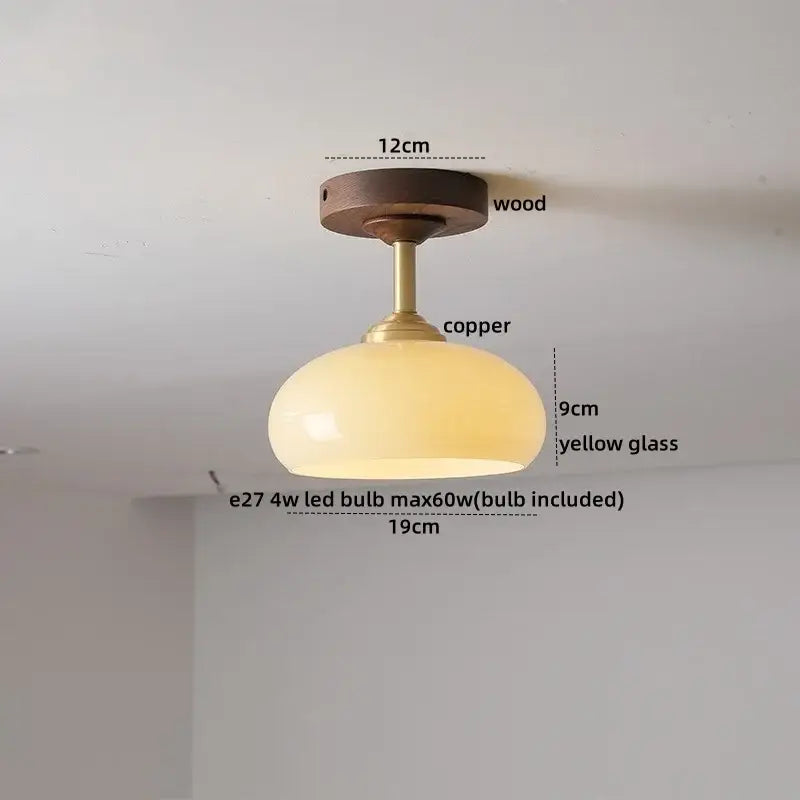 Modern amber glass and copper ceiling light fixture dining room