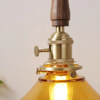 amber glass led pendant light with walnut dining room