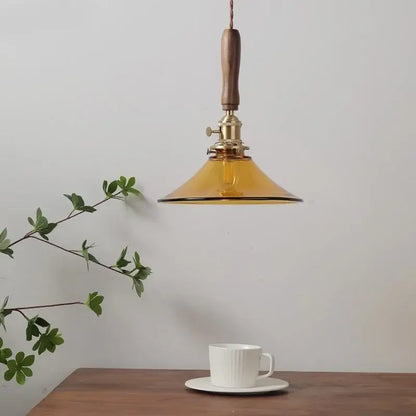 amber glass led pendant light with walnut dining room