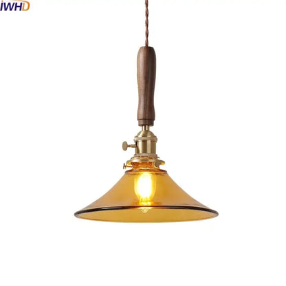 amber glass led pendant light with walnut dining room