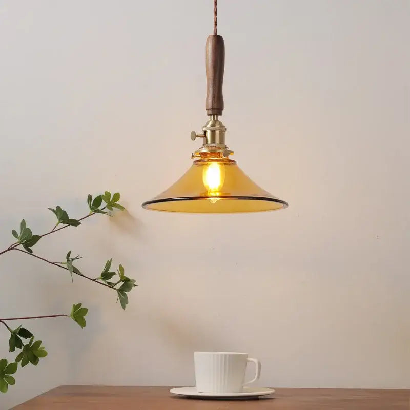 amber glass led pendant light with walnut dining room