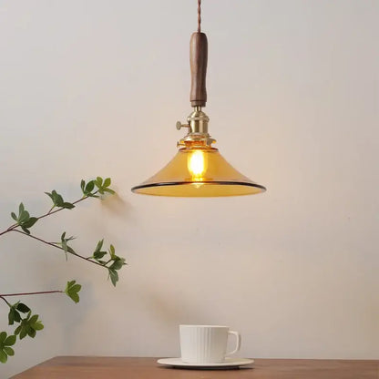 amber glass led pendant light with walnut dining room