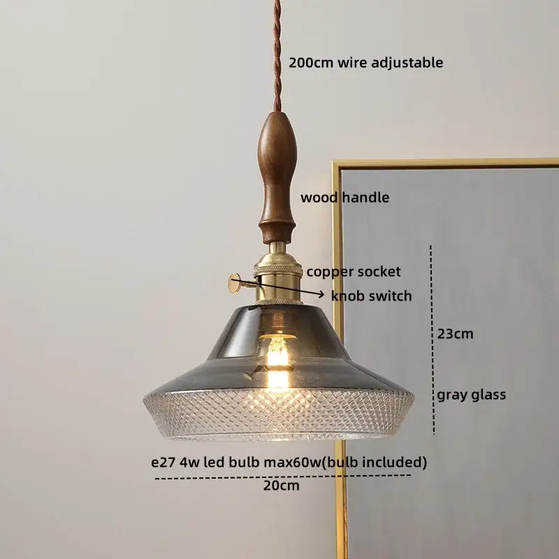 Modern amber glass pendant light with wood handle dining room