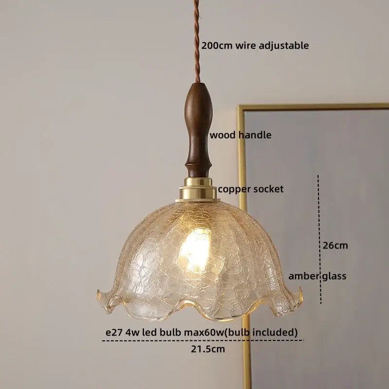 Modern amber glass pendant light with wood handle dining room