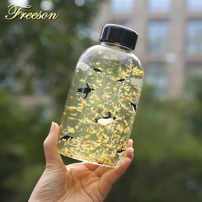 Kawaii penguin glass water bottle with yellow flowers kitchen travel