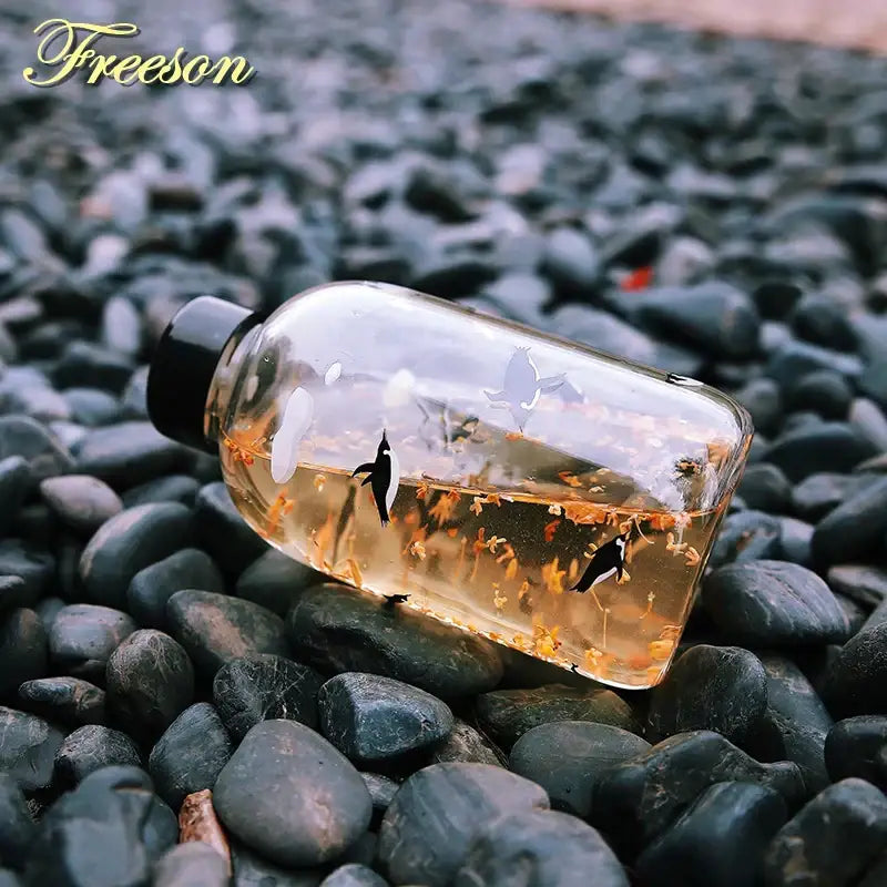Kawaii penguin glass water bottle with yellow flowers kitchen travel