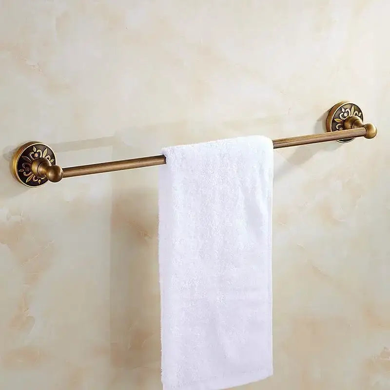 Antique brass floral bath hardware set with towel rack and toilet brush