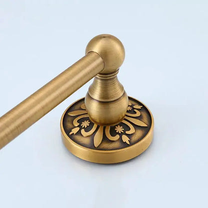Antique brass floral bath hardware set with towel rack and toilet brush