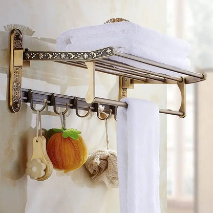 Antique brass floral bath hardware set with towel rack and toilet brush