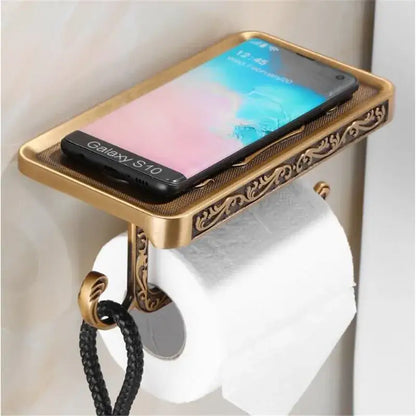 Antique brass ornate toilet paper holder with phone shelf bathroom