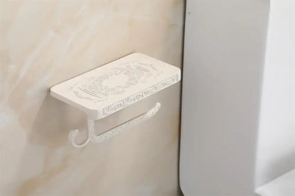 Antique brass ornate toilet paper holder with phone shelf bathroom