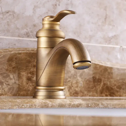 Antique brass basin faucet with curved spout for bathroom sinks