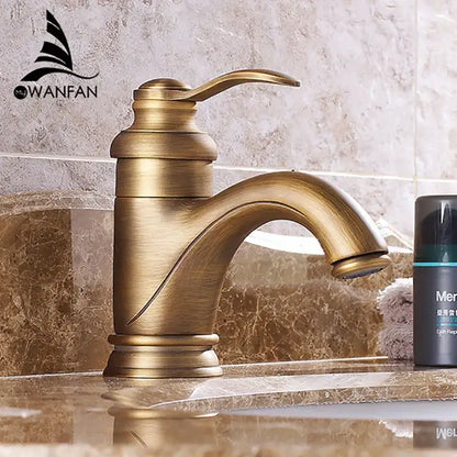 Antique brass basin faucet with curved spout for bathroom sinks