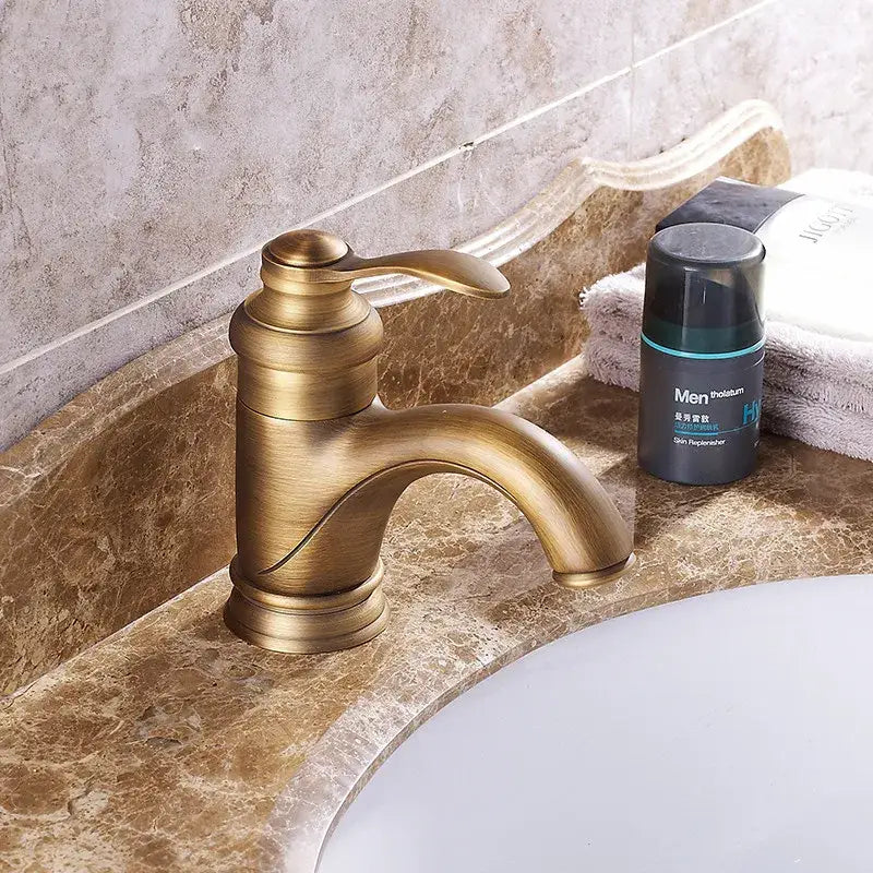 Antique brass basin faucet with curved spout for bathroom sinks