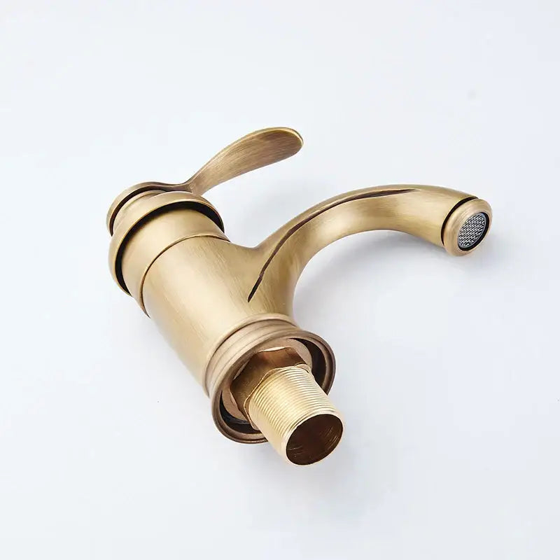 Antique brass basin faucet with curved spout for bathroom sinks