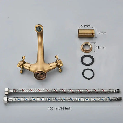 Antique brass basin faucet with ornate cross handles for bathroom