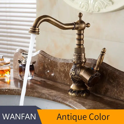 Antique brass basin faucet with engraved floral detail kitchen tap