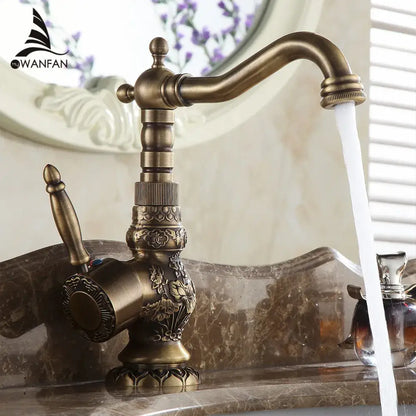 Antique brass basin faucet with engraved floral detail kitchen tap