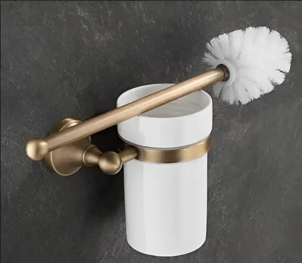 Antique brass bathroom accessory set with wall shelf