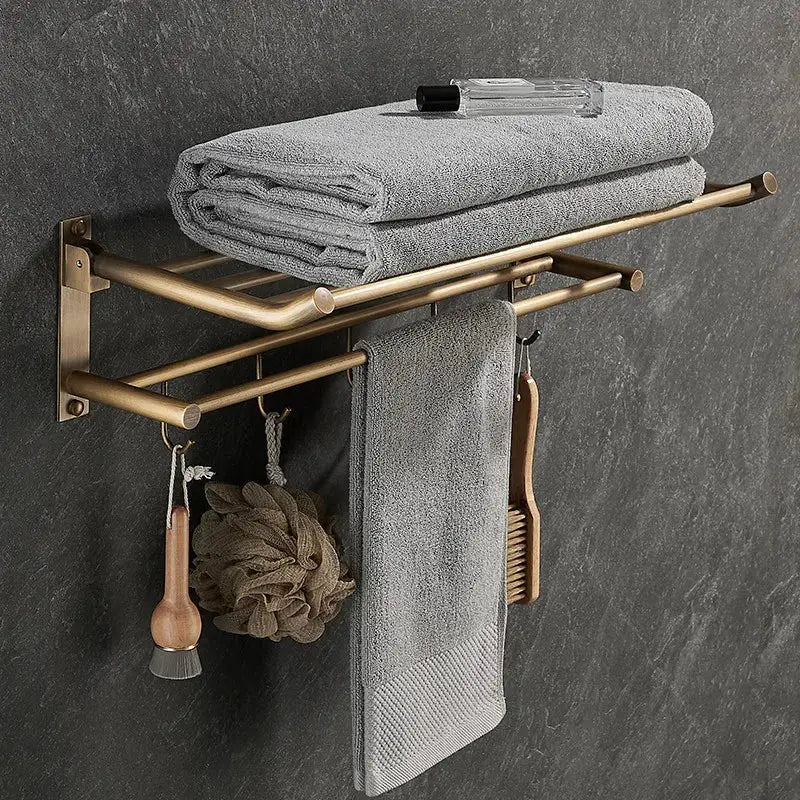 Antique brass bathroom accessory set with wall shelf