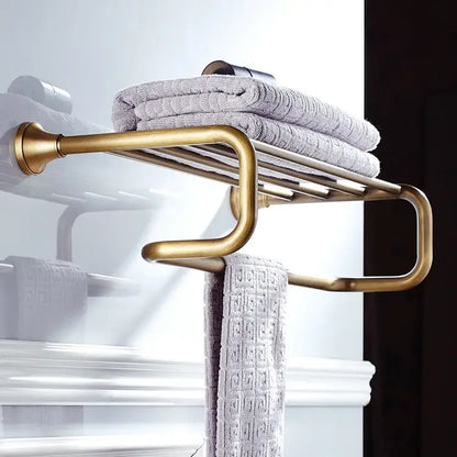 Antique brass bathroom accessory set with wall shelf