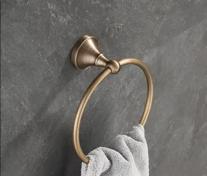Antique brass bathroom accessory set with wall shelf