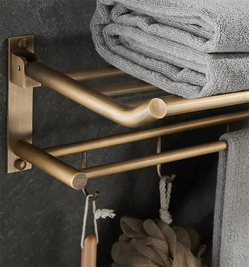 Antique brass bathroom accessory set with wall shelf