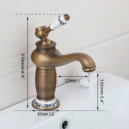 Antique brass bathroom basin faucet with floral ceramic handle