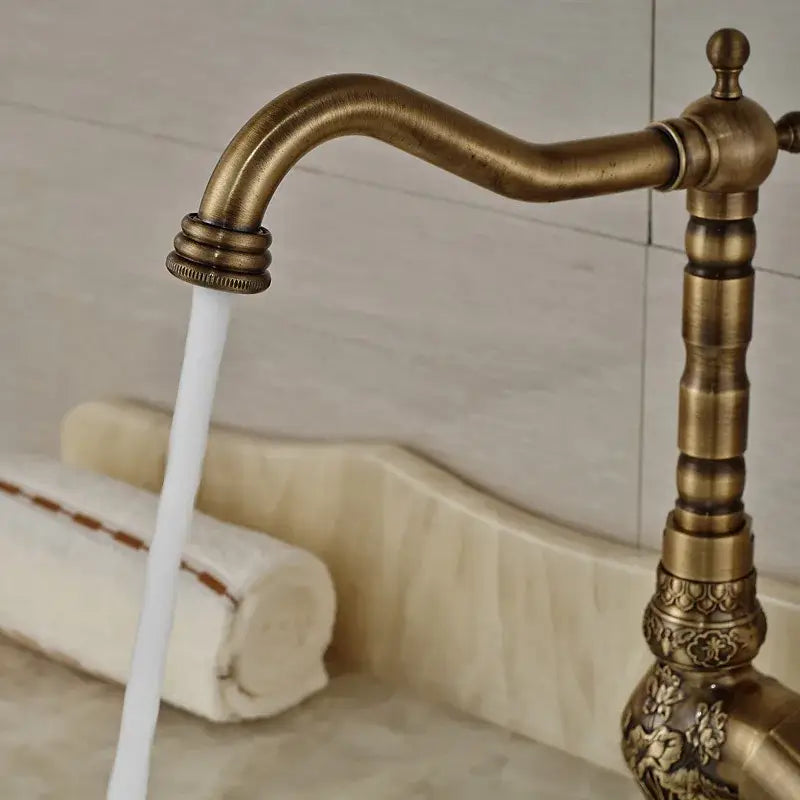 Antique brass ornate single handle faucet – bathroom sink tap