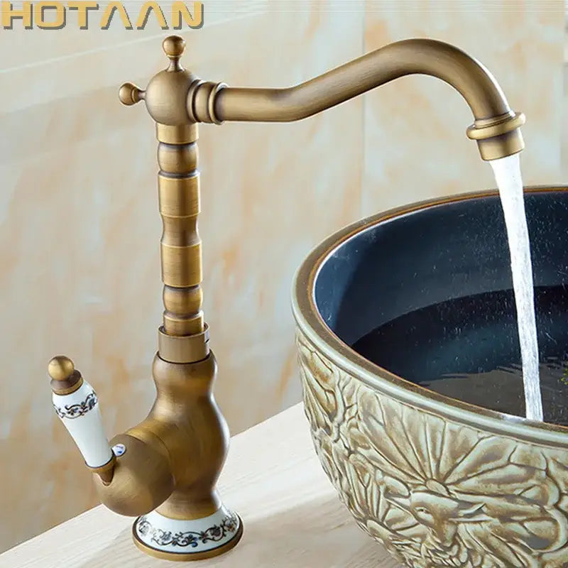 Antique brass single handle faucet with ceramic base bathroom sink