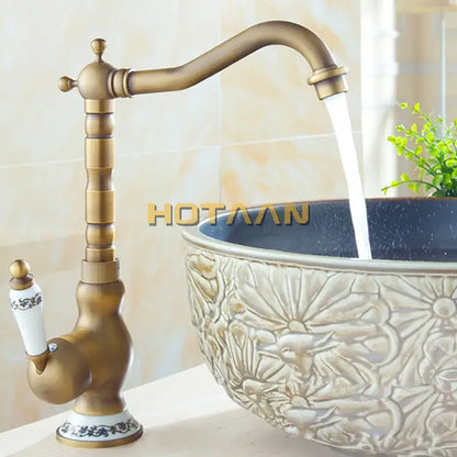 Antique brass single handle faucet with ceramic base bathroom sink