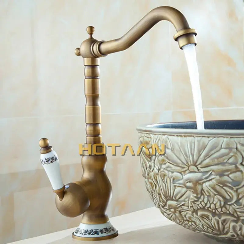 Antique brass single handle faucet with ceramic base bathroom sink