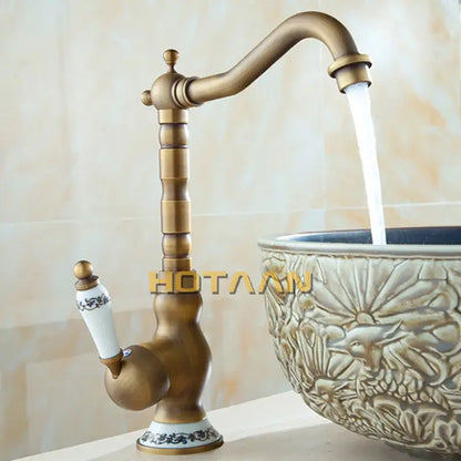 Antique brass single handle faucet with ceramic base bathroom sink
