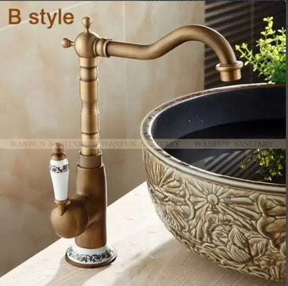 Antique brass and white ceramic bathroom sink faucet swivel spout