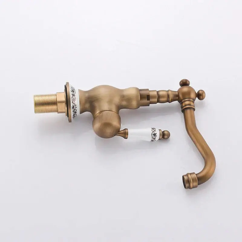 Antique brass and white ceramic bathroom sink faucet swivel spout