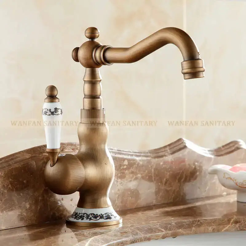 Antique brass and white ceramic bathroom sink faucet swivel spout