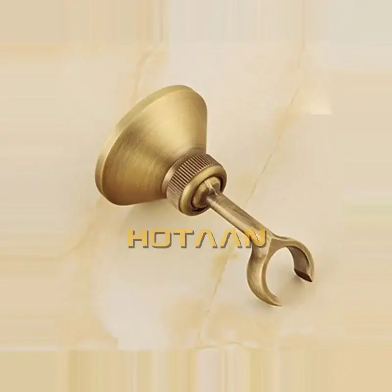Antique brass bidet with floral ceramic knobs for bathroom